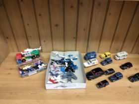 A tray of playworn Vehicles includes dinky taxes, corgi smiths karrier shop and many others