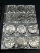 Album of 120 various and collectable fifty pence coins; Mostly Paddington bear, Beatrix potter and