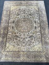 Arabic silk wool rug; yellow ground, designed with various wild animals and ornate trims. [