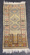 A Oriental hand knotted wool rug [152x80cm]