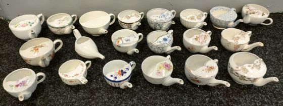 A large collection of porcelain shaving mugs