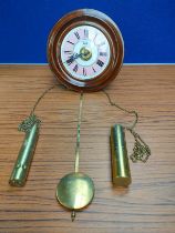 19th century Black Forest postman's alarm wall clock, the pink and white dial with black Roman