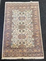 A Fine wool hand knotted oriental Rug signed [Signed Nain?] [191x123cm]