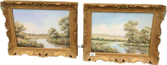 A pair of Tony Mercier oil paintings depicting countryside scenes fitted in gilt frames