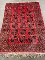 Antique Persian red ground rug. [300x218cm]