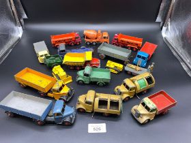 A collection of playworn vehicles, trucks and trailors mostly Dinky Meccano