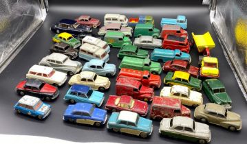 A selection of playworn car models mostly Corgi and Dinky