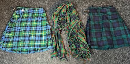 Two Childs kilts and tartan plaid.