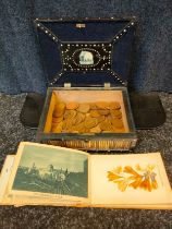 A Victorian ebony and porcupine quill box full of old penny's along with Palestine flowers album