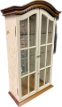 Contemporary two door small wall display cabinet. Mirror backing and glass interior shelves. [79cm