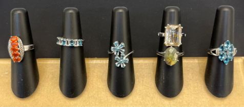 A Lot of six 925 silver and gem stone rings.
