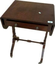 Mahogany side table, the rectangular top flanked by drop ends above a frieze drawer, raised on