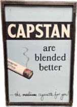 Original metal and enamel Capstan Navy cut cigarette advertising sign, fitted within a wooden frame.