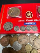 Box of mixed British Pre Decimal coins; Various silver coins- Three pences and One Florin. Two