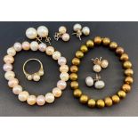 Five pairs of cultured pearl ear studs, various sizes, all post and butterfly fittings; a 9ct gold