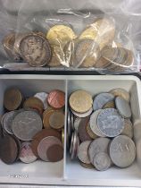 A Small safe box containing mixed world coins and a collection of 1797 George III Tokens.