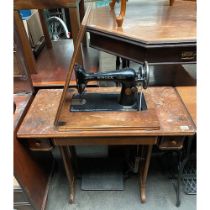 A vintage singer sewing machine table [78x87x40.5]