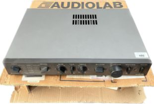 Audiolab 8000A Amplifier with main power cable and box.