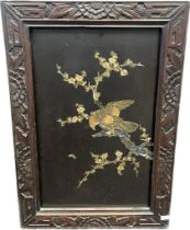 Antique Chinese lacquered and mother or pearl shell inlay panel depicting bird of prey perched on