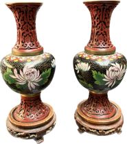 A Pair of Chinese cloisonné and red cinnabar worked vases- with wooden carved bases. [21cm high]