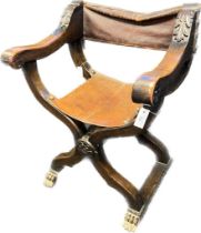 19th century Italian Walnut Savonarola Chair- of typical form with a brown leather back and seat.