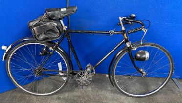 A vintage rudge whitworth bicycle with fitted Brookes saddle, Brooke vintage travel bag and fitted