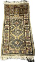 A Oriental hand knotted wool rug [152x80cm]