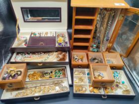 Two jewellery boxes containing a mixed collection of jewellery.