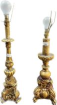 Two 19th century Regency gilt painted table lamps.