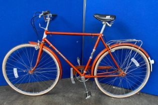 A vintage Puch elegance bike with fitted leather saddle