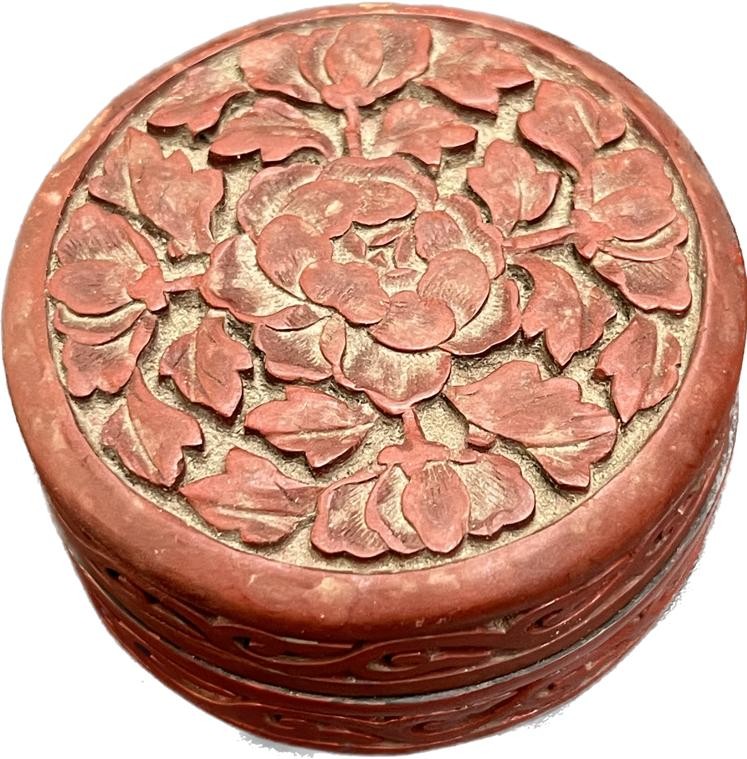 Small Antique Chinese Red lacquered Cinnabar floral design lidded ink pot. [6cm diameter]