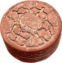 Small Antique Chinese Red lacquered Cinnabar floral design lidded ink pot. [6cm diameter]