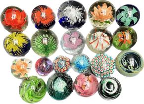 A Collection of various art glass paperweights.