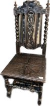 19th century Jacobean style hand carved oak chair.