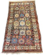 A Large eastern themed patched work rug [214x122cm]