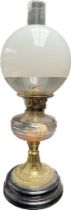 Antique paraffin desk lamp; Glass funnel and glass globe, Ribbed effect paraffin holder, raised on
