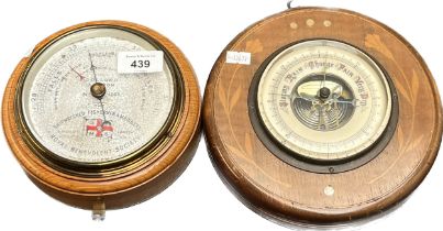 Two various wall barometers; Marine Aneroid Barometer made by Dollond London No.1264. 'Shipwrecked