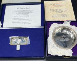 Two silver royalty items; The Danbury Mint Silver ingot with presentation case and boxed Sheffield