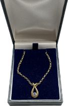 9ct yellow gold and round cut sapphire pendant, together with a 9ct yellow gold necklace. [3.