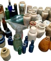 A Large collection of 19th century Scottish adverting stone vases, stone ware bottles & antique