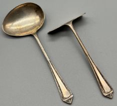 Birmingham silver baby pusher and spoon. Produced by Lanson Ltd.