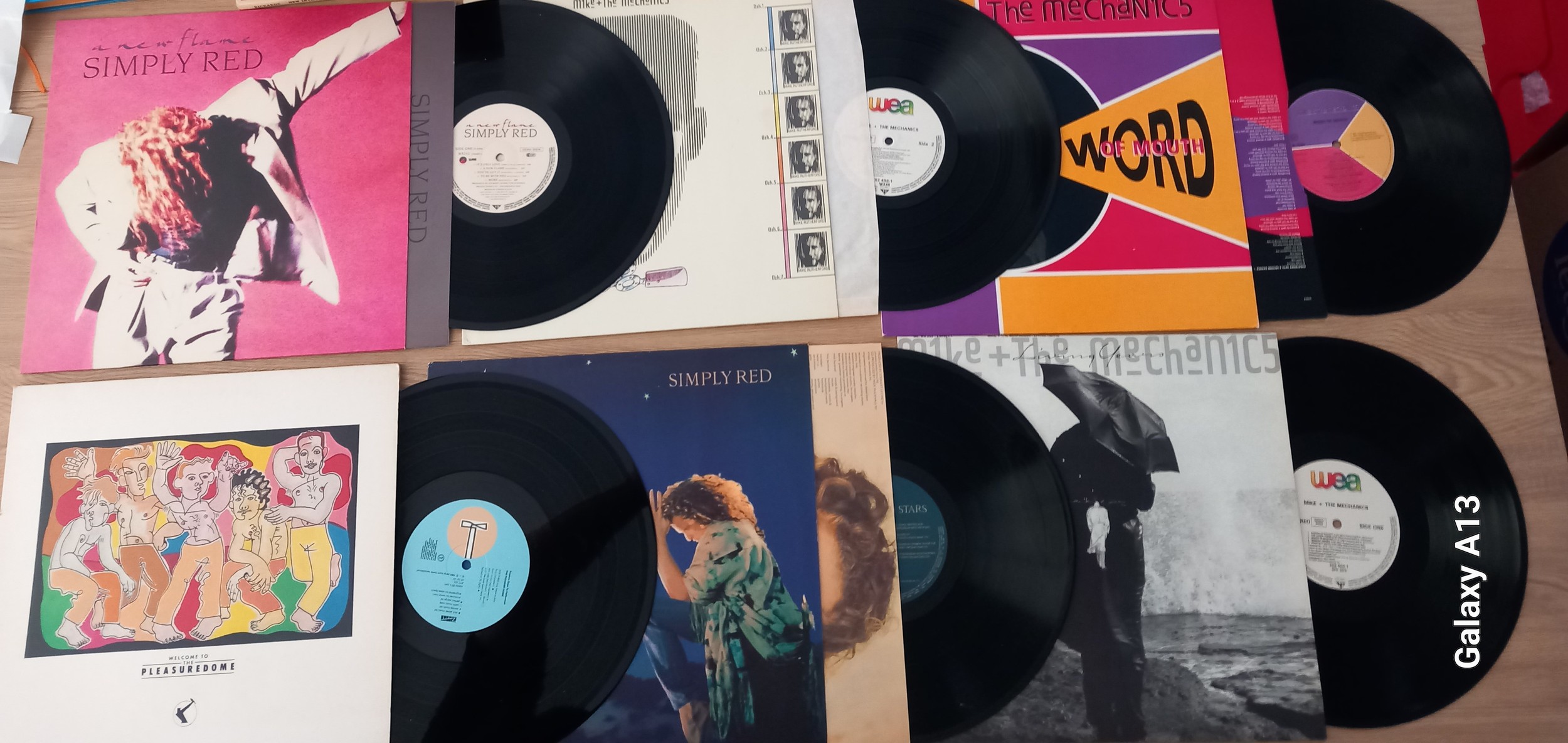 A Set Of Original Vinyl's to include: Mike And The Mechanics, Word Of Mouth and Mike. Simply Red