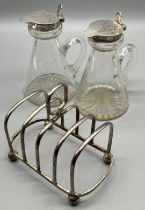 A Pair of London silver topped whisky Toddy/ Noggin decanters- produced by H&H. Together with a