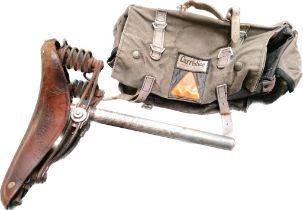 An antique bicycle saddle by Brooks ltd along with Carradice vintage bicycle bag