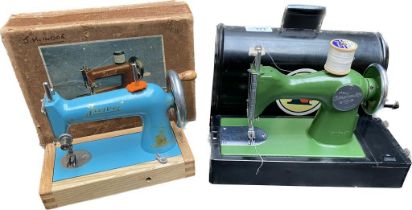 An Original Children’s Toy Mini Sewing Machine & a vintage funel children's sewing machine