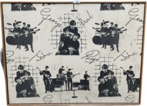 A Framed original 'The Beatles' wall paper framed strip.