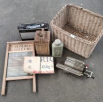 A collection of antique items; Esso vintage petrol can, vintage Roberts radio & antique wash board