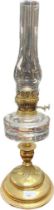 An antique brass & glass oil lamp with funnel cover [57cm]