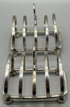 A Pair of Sheffield silver four slice toast racks. Produced by Harrison Brothers & Howson. [