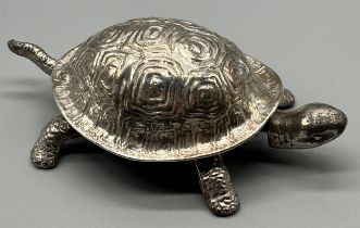 A Novelty George V Chester silver topped tortoise table bell, with clockwork mechanism and metal